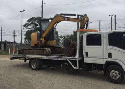 Excavator towing Melbourne
