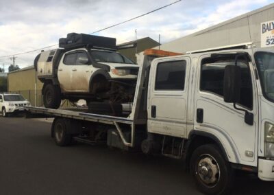 Our team towing a Ute stuck on mud - roadside assistance service