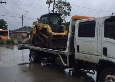 Our team towing a heavy machinery in Melbourne